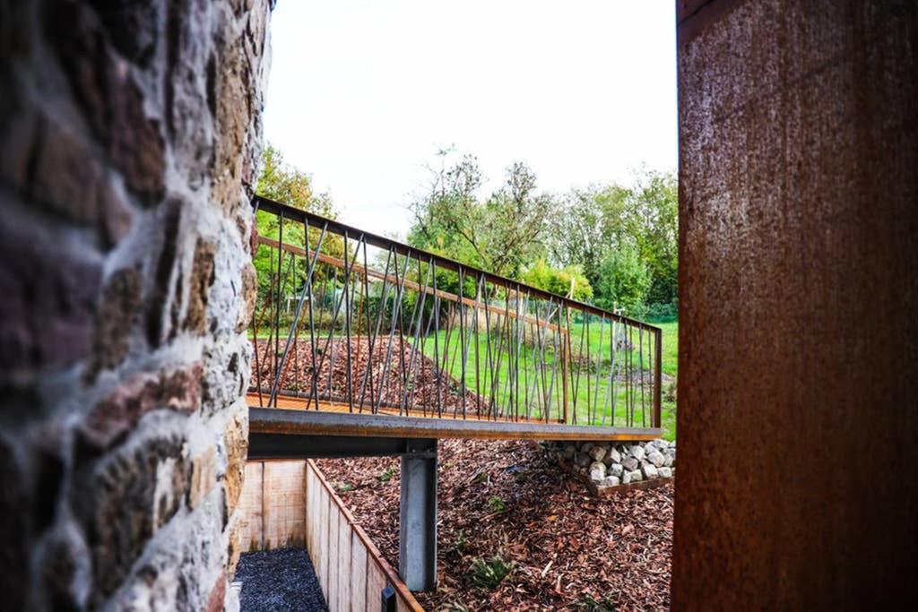Amazon Corten Marche-en-Famenne Extérieur photo